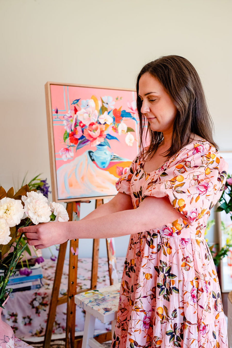 Helen McCullagh working with artwork