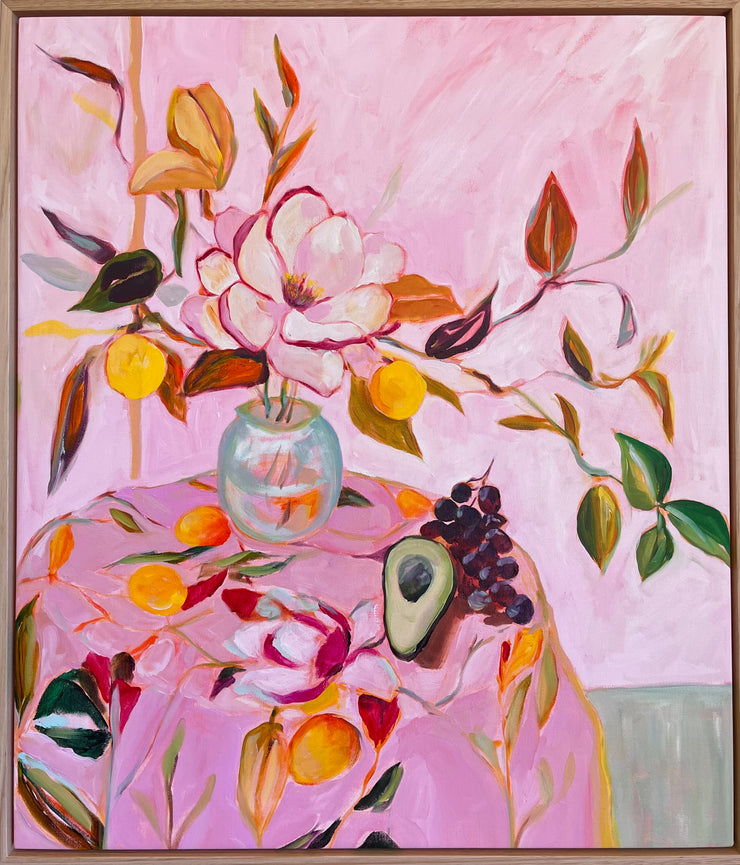 Magnolia, avocado and grapes on magnolia
